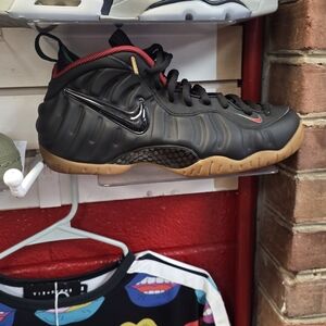 Nike Kids Black and Red Foamposite Sneakers